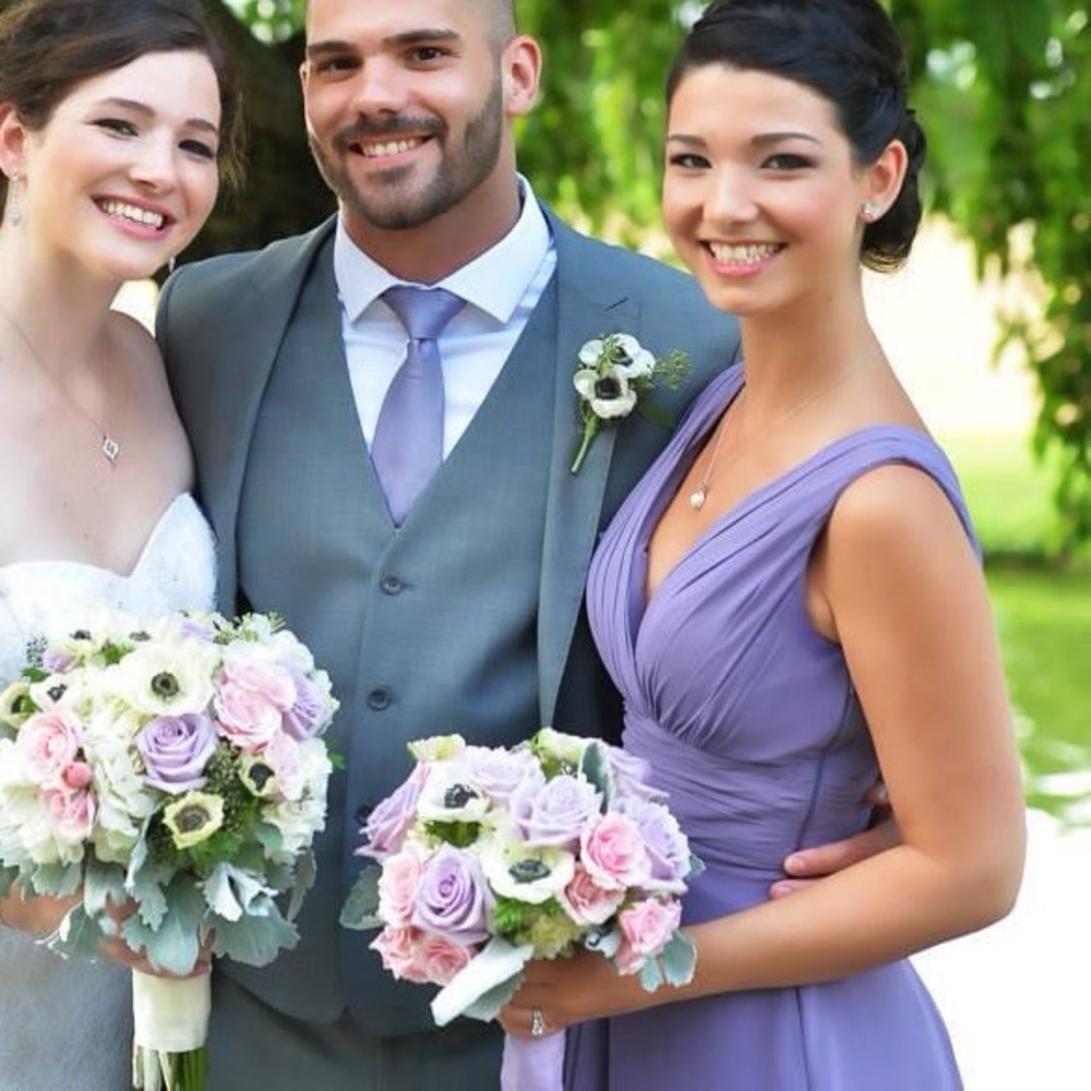 Purple bill levkoff bridesmaid dress. Did not fit my daughter.
